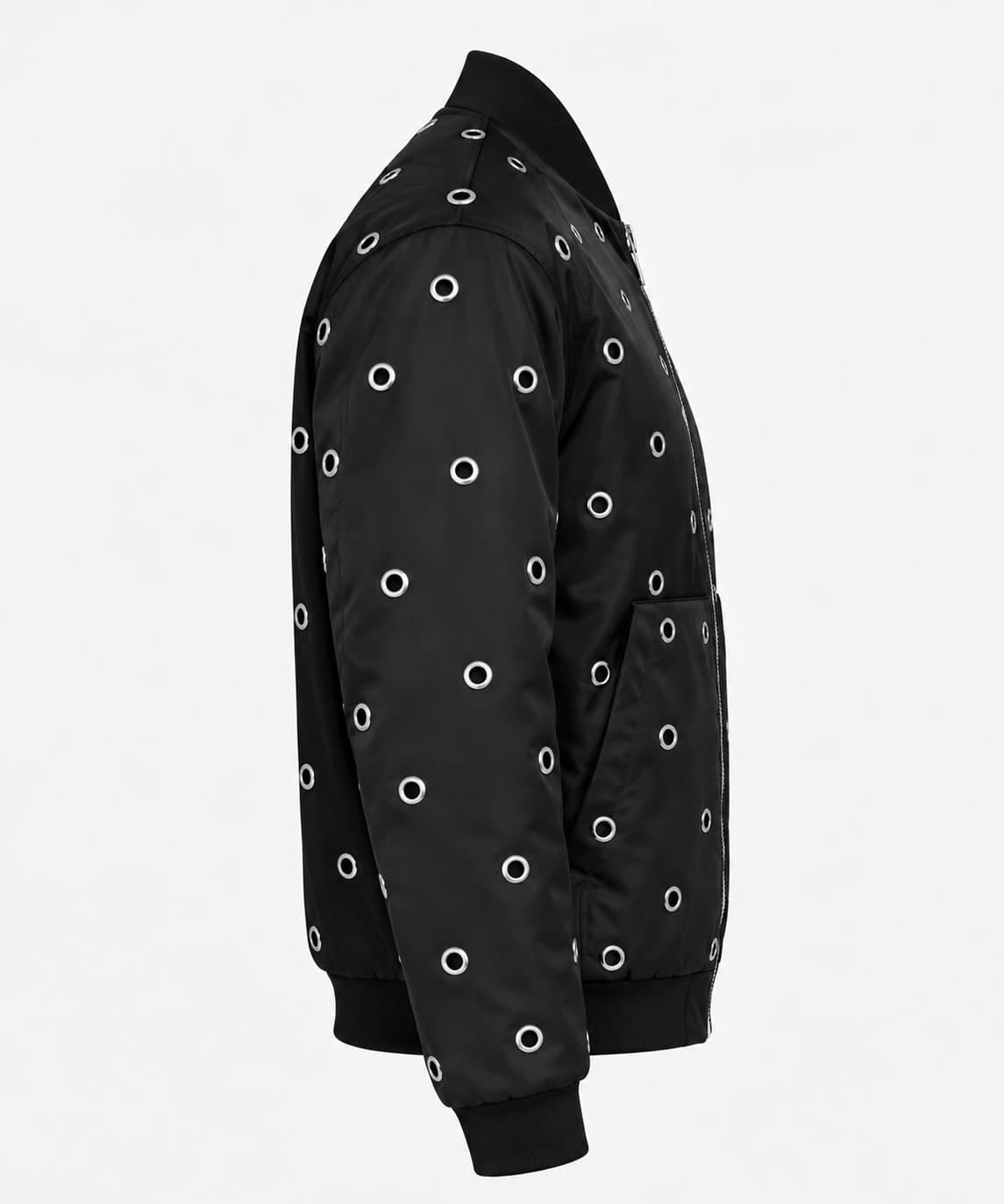Black satin bomber jacket with silver eyelets, side view, showing the ribbed cuff and hem