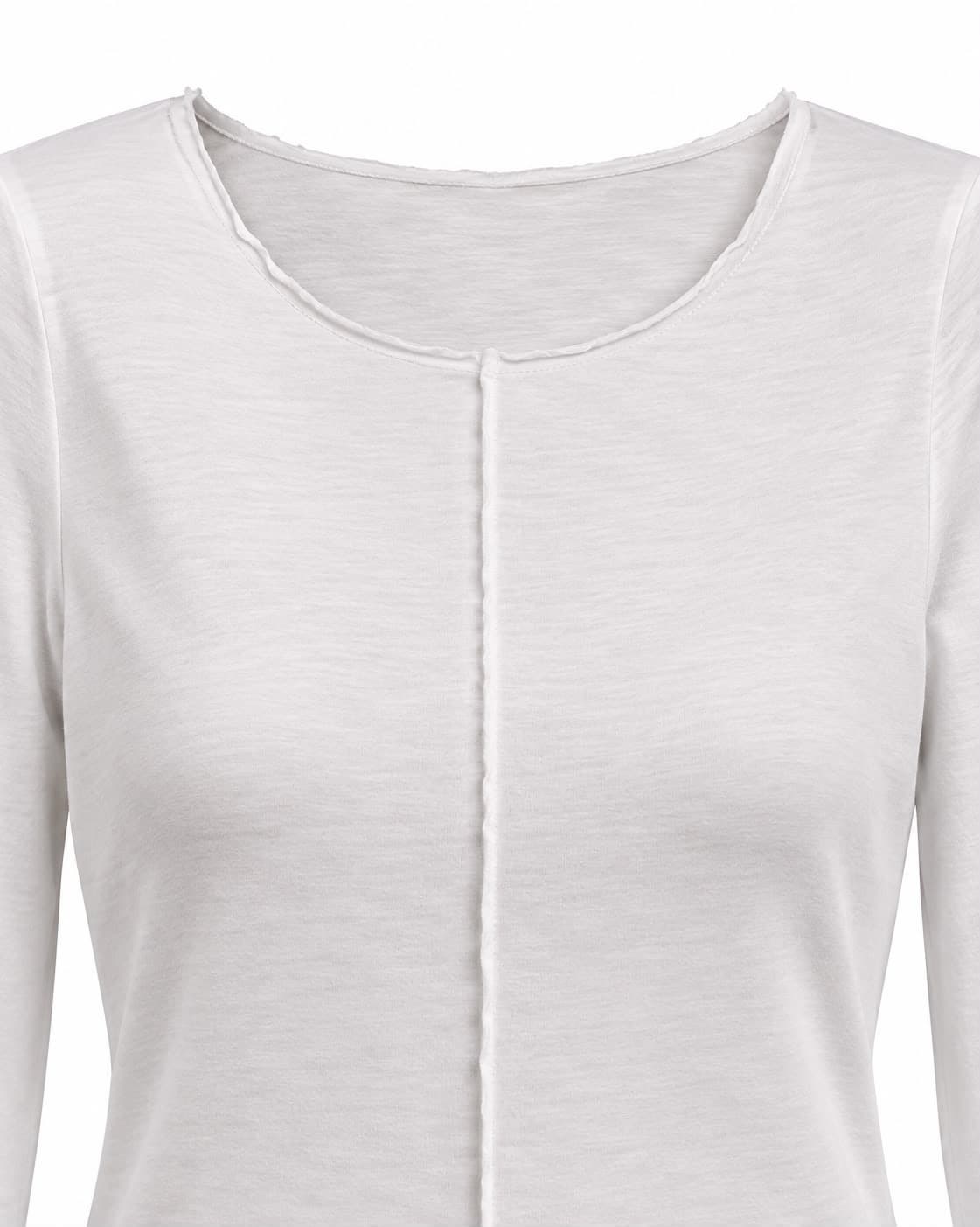 Close-up of the round neckline and centre-front seam of the ivory ribbed gown