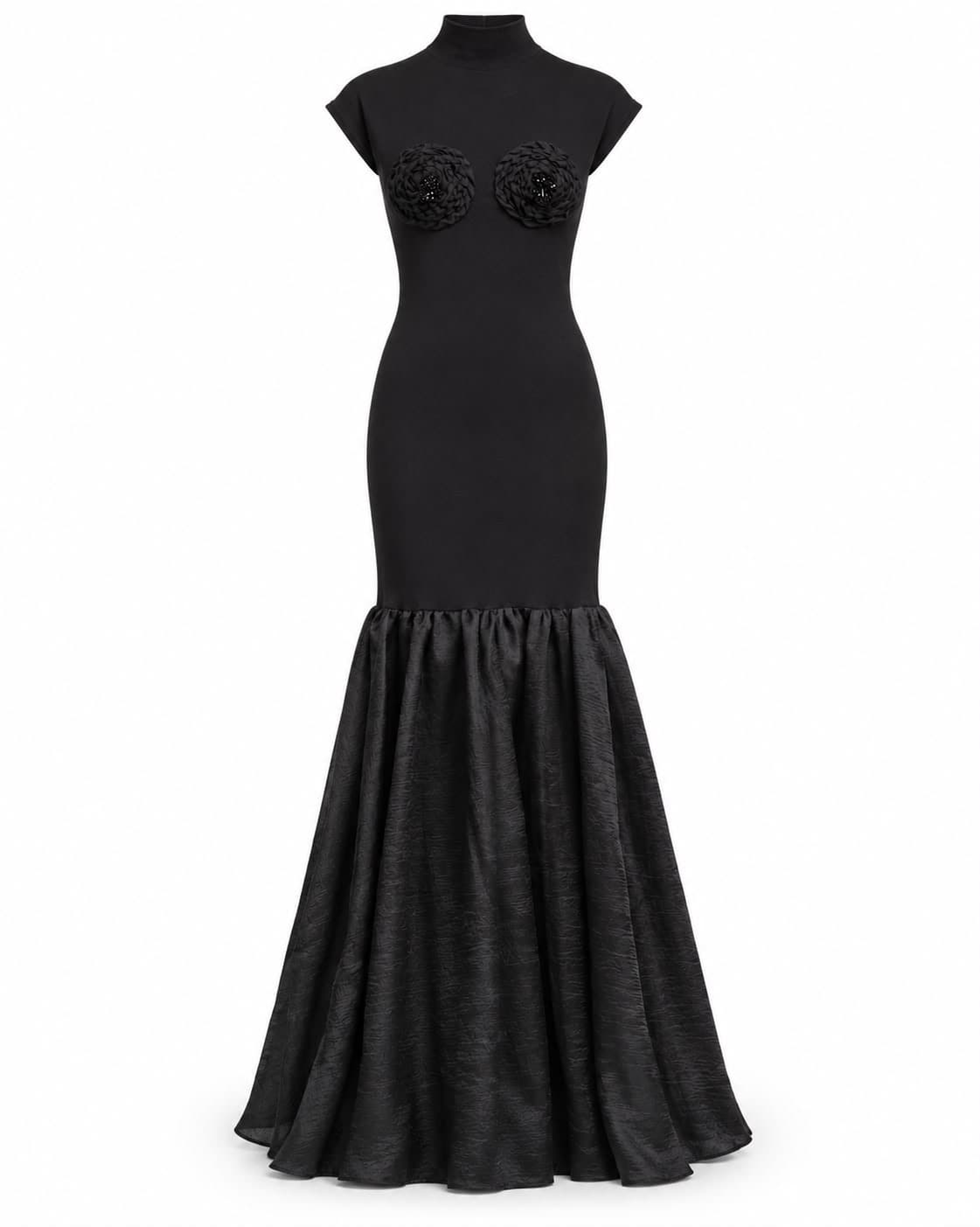 Black jersey gown, front view, showing the bust rosettes and full textured skirt