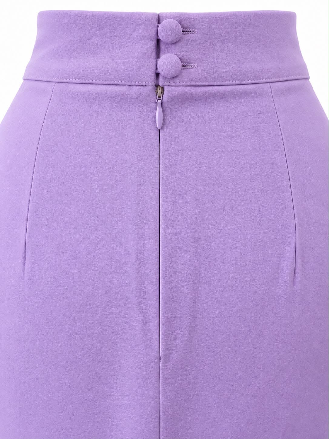 Waistband detail with two covered buttons and the back zip