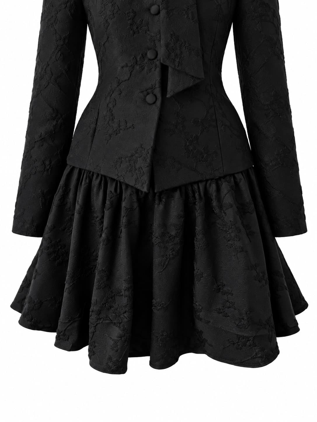Tiered brocade ruffle at the hem