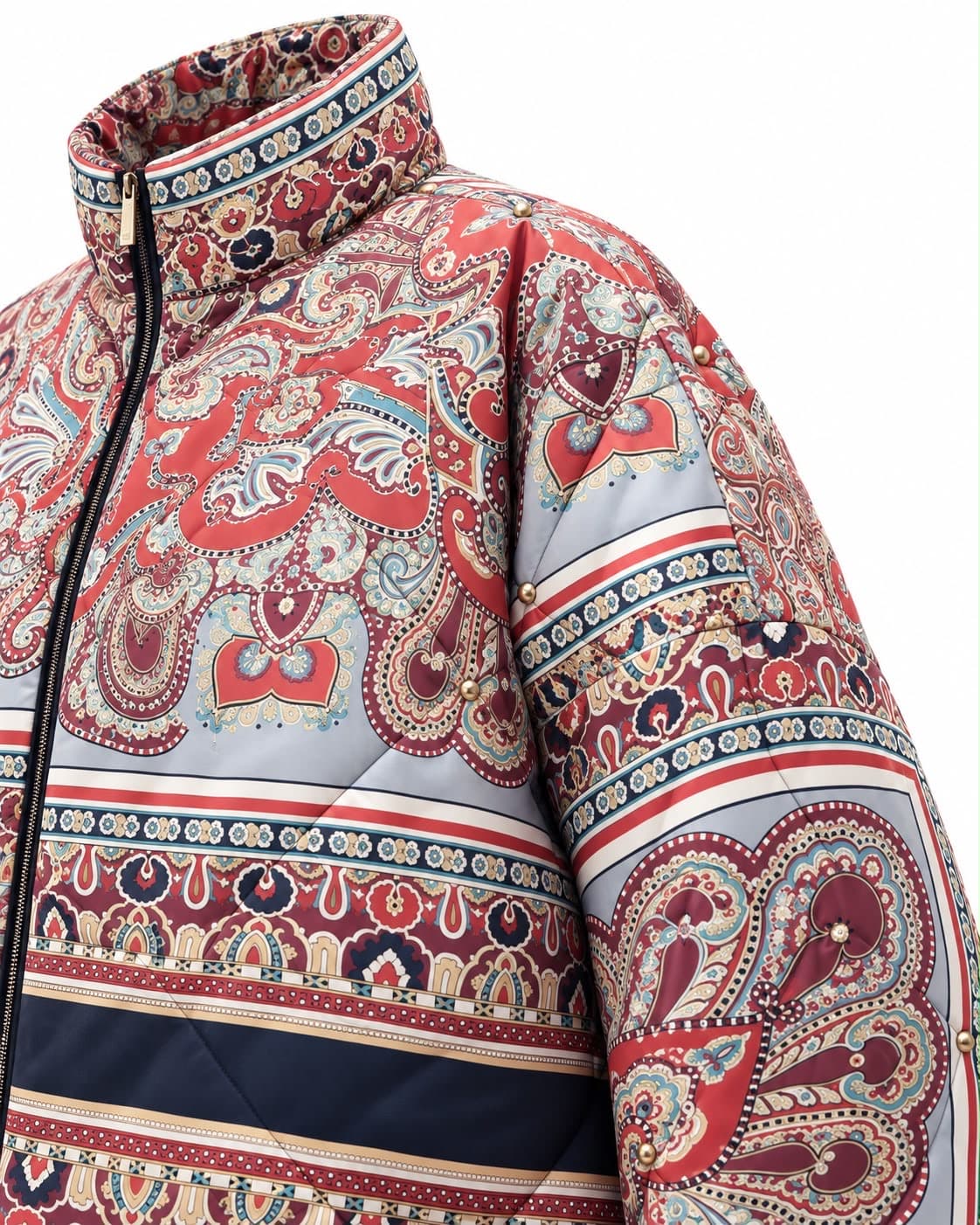 Close-up of the stand collar and paisley print of the puffer jacket